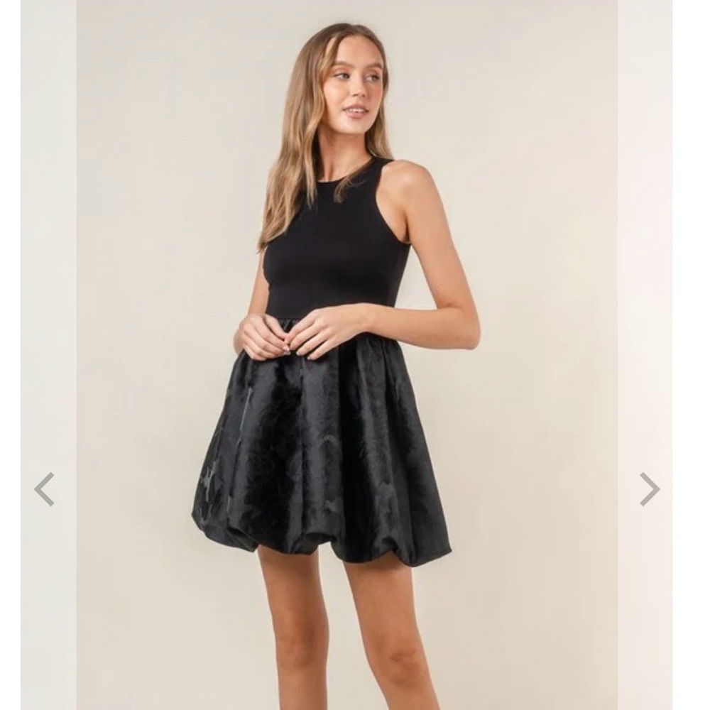 Black Bubble Hem Mini Dress
Size M